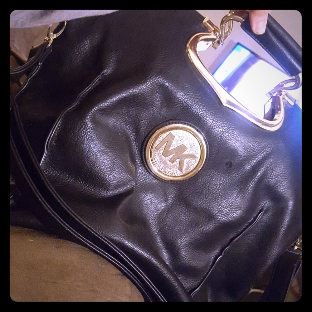 MK purse and MK sunglass case